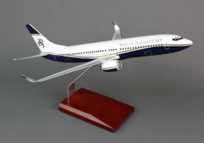 Executive Series Display Model Boeing Business Jet New Livery B737-700  Crafted from resin and comes with a wooden base.  Item: H10510